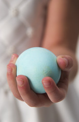 Child holding Easter egg
