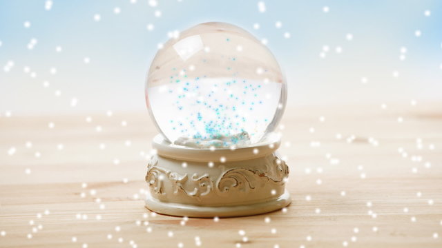 Ornament snow globe with falling snow