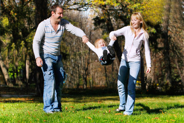 Fototapeta premium playing family on natural background