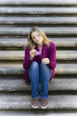 Teen Girl Sitting On Stairs