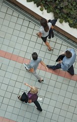 Business people walking overhead view