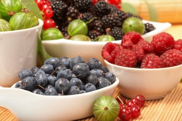 Berries in plates, on a table