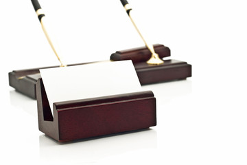 Card holder with blank white business card and two pens