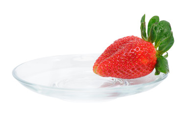 one strawberry on plate