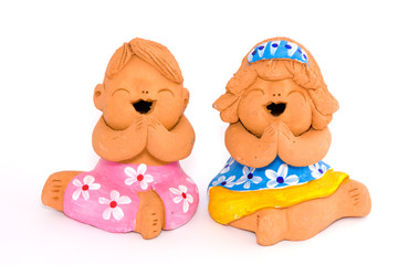 Boy and girl of clay figurine