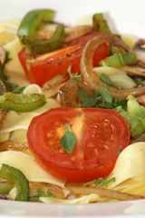 home made tagliatelle with organic tomato and herbs