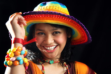 happy woman with tropical colorful hat