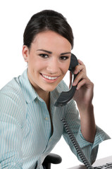 Young businesswoman on the phone, isolated on white