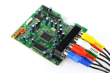 The printed-circuit board with connected videos and audio cables