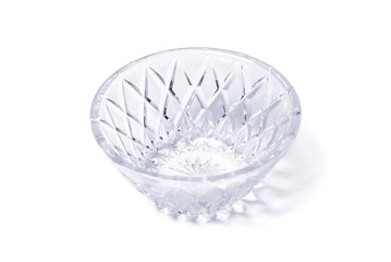 Empty crystal vase on white
