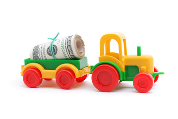 The toy tractor transortation money