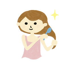 髪をとかす女の子