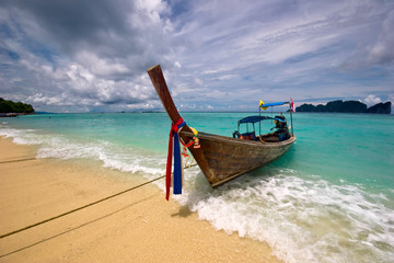 Fototapeta na wymiar Boat in the tropical sea. Phi Phi island. Thailand