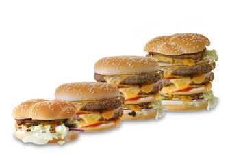 A row of huge cheeseburgers isolated on white background