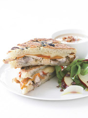 tuscan chicken panini and arugula-pear salad with olive vinaigre