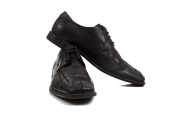 pair of men's dress shoes on white