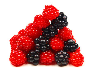 Raspberries and blackberries isolated on white
