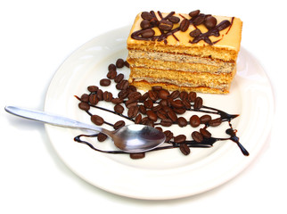 Coffee cake with coffee beans and chocolate isolated on white