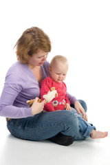 Mother and daughter playing with toys