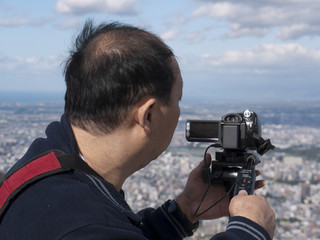 Obraz premium Man with camera