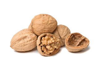 Cracked walnuts isolated on white background