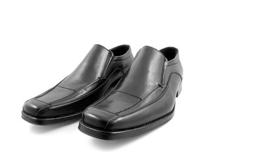 Pair of black shiny men shoes over white background