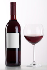 Bottle and glass of red wine