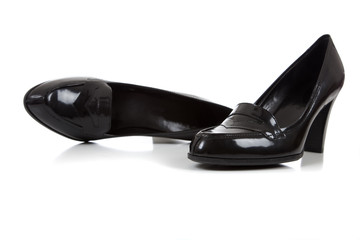 Women's black dress shoes on a white background