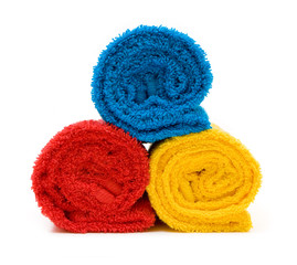 Colorful towels isolated on white background