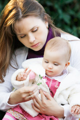 loving mother and daughter on natural background