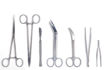 Surgeon tools - scalpel, forceps, clamps, scissors - isolated