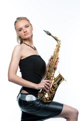 sexy sensual blonde girl with saxophone isolated on white