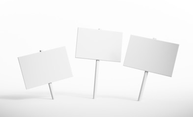 Three isolated blank signs on a white surface