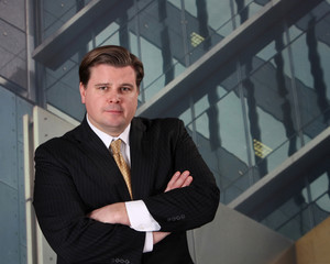 Businessman in front of an office building