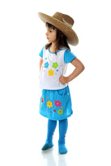 Little girl in hat isolated on white background