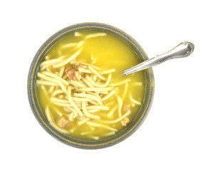 Chicken noodle soup with spoon