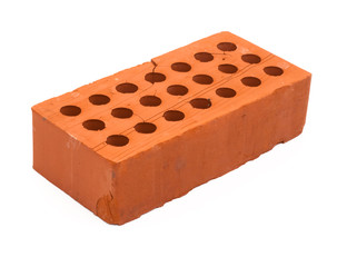 New red perforated ceramic brick isolated on white