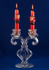 Two candles in crystal candlestick