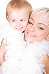 cute daughter and her mother with puffy boa