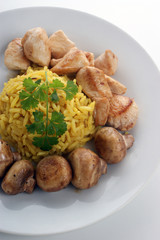 organic rice on a plate with pork goulash