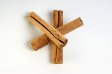 organic cinnamon sticks on a white background