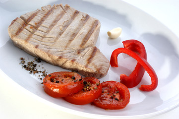 tuna steak with red paprika and tomato