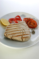 tuna steak with red paprika and tomato