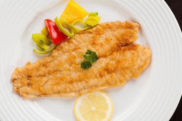 Fish dish - fried cod fillet with vegetables