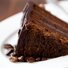 Delicious chocolate cake with coffee beans