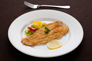 Fish dish - fried cod fillet with vegetables
