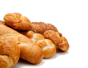 Various types of bread on a white background