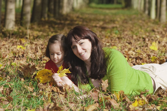Mother and her baby girl in the park