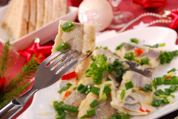 herring in oils with chive and onion for christmas