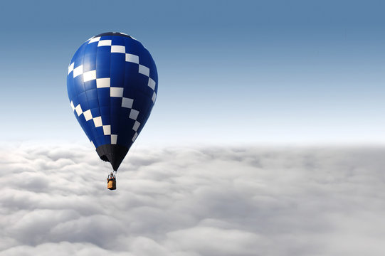 hot air balloon flying over the sky